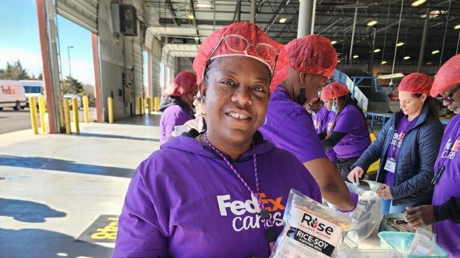 FedEx volunteers package thousands of meals to help end hunger FedEx